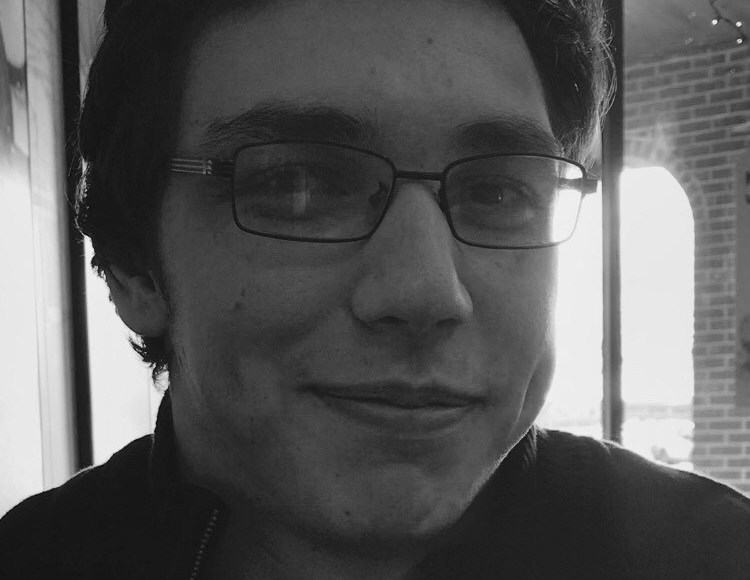 Black-and-white close-up of Noah Hubbard, interviewed in the story