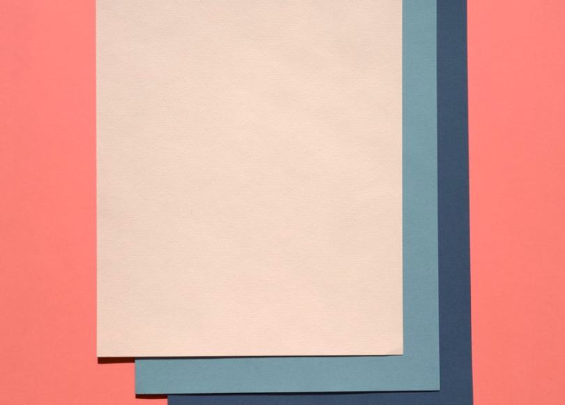 Colored sheets of paper stacked on top of one another