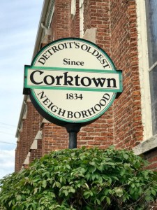 Close-up view of street sign that reads "Detroit's oldest neighborhood, Corktown, Since 1834"