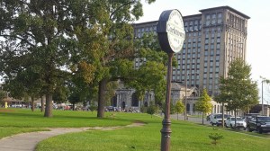 Street sign in front of large building