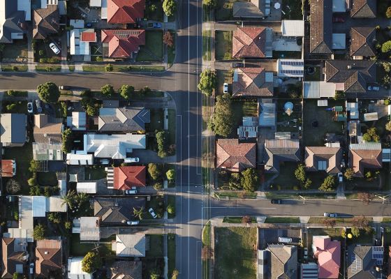 Aerial view of houses and intersecting streets.