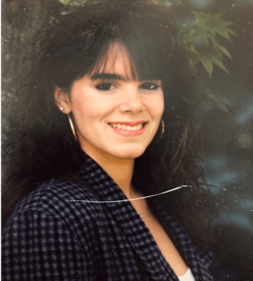 Smiling woman, long black hair