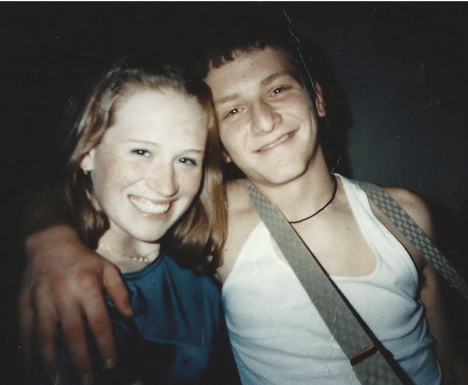 Young couple smile at camera,